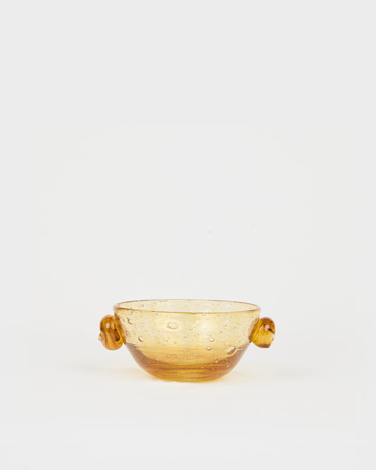 Amber glass bowl with handles on a white background, Poppy Cup – La Romaine Editions Bubble Glass – Maison Holder