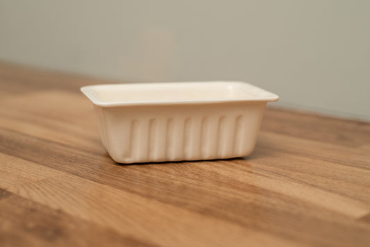 Rectangular white ceramic dish on a wooden surface with a neutral background, Small French Fries Tray – Desvres Earthenware – Maison Holder