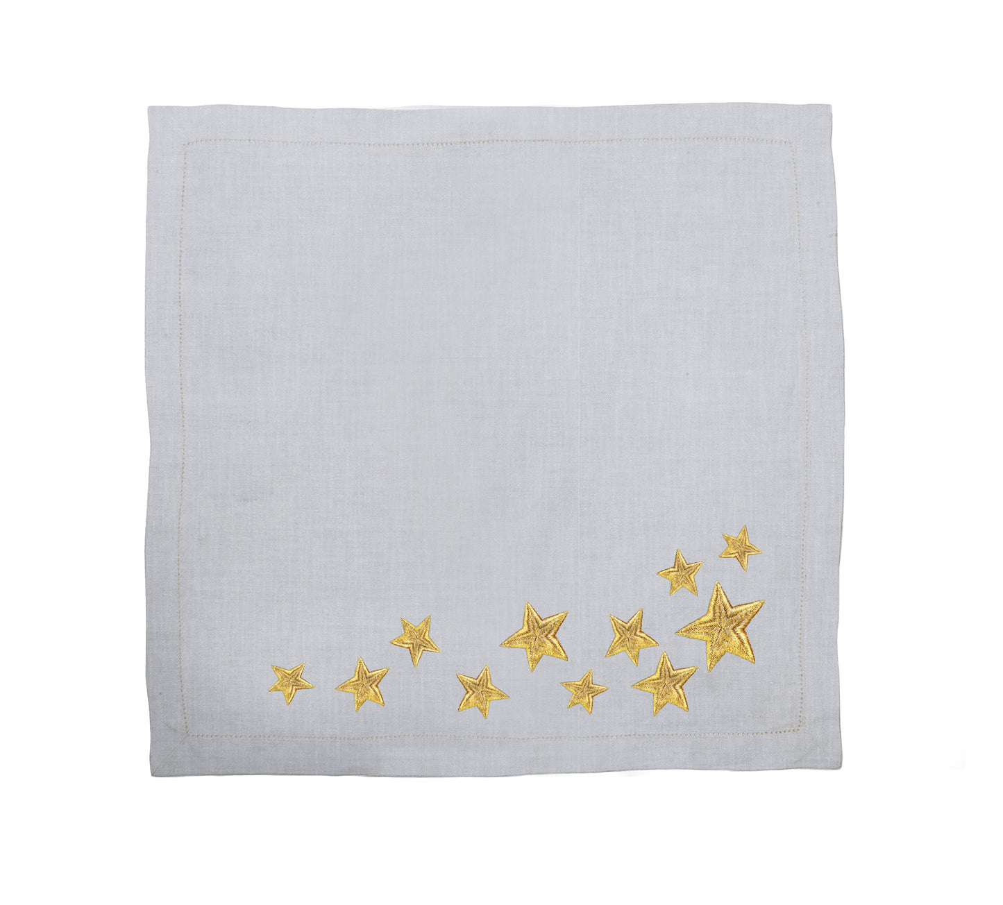 Light gray towel with gold star patterns on a white background, Lucky Stars Linen Tablecloth – Hand Embroidered – Maison Holder