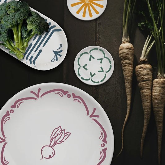 Decorative plates with vegetable illustrations on a dark surface with vegetables. Veggies Small Plate - Set of 4