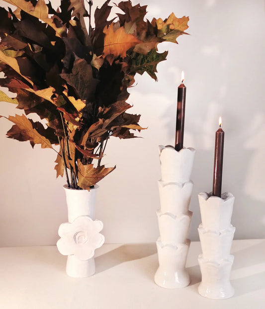 White ceramic candle holders with candles and a bouquet of autumn leaves on a white background, Bela Silva Girandoles Flower Power Vase – Terracotta – WAWW

