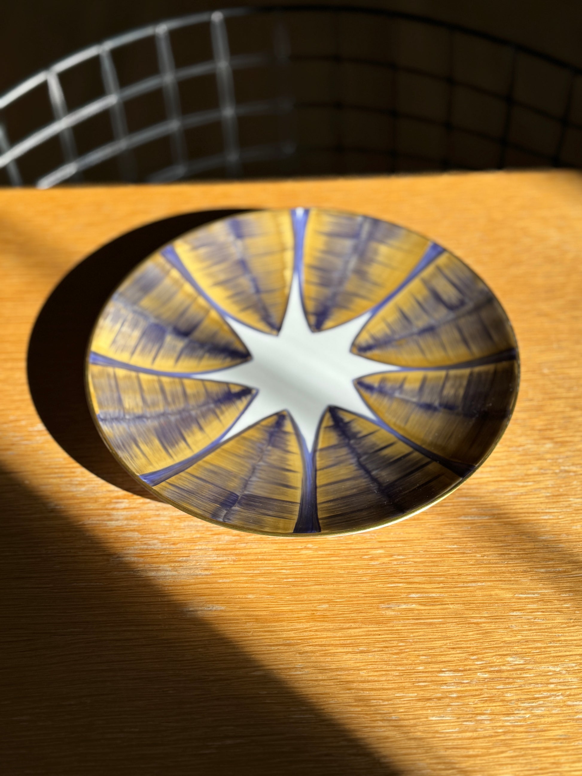 Decorative glass coaster with star pattern on a wooden surface, Agave Hand-Painted Dessert Plate – Porcelain – Marie Daâge