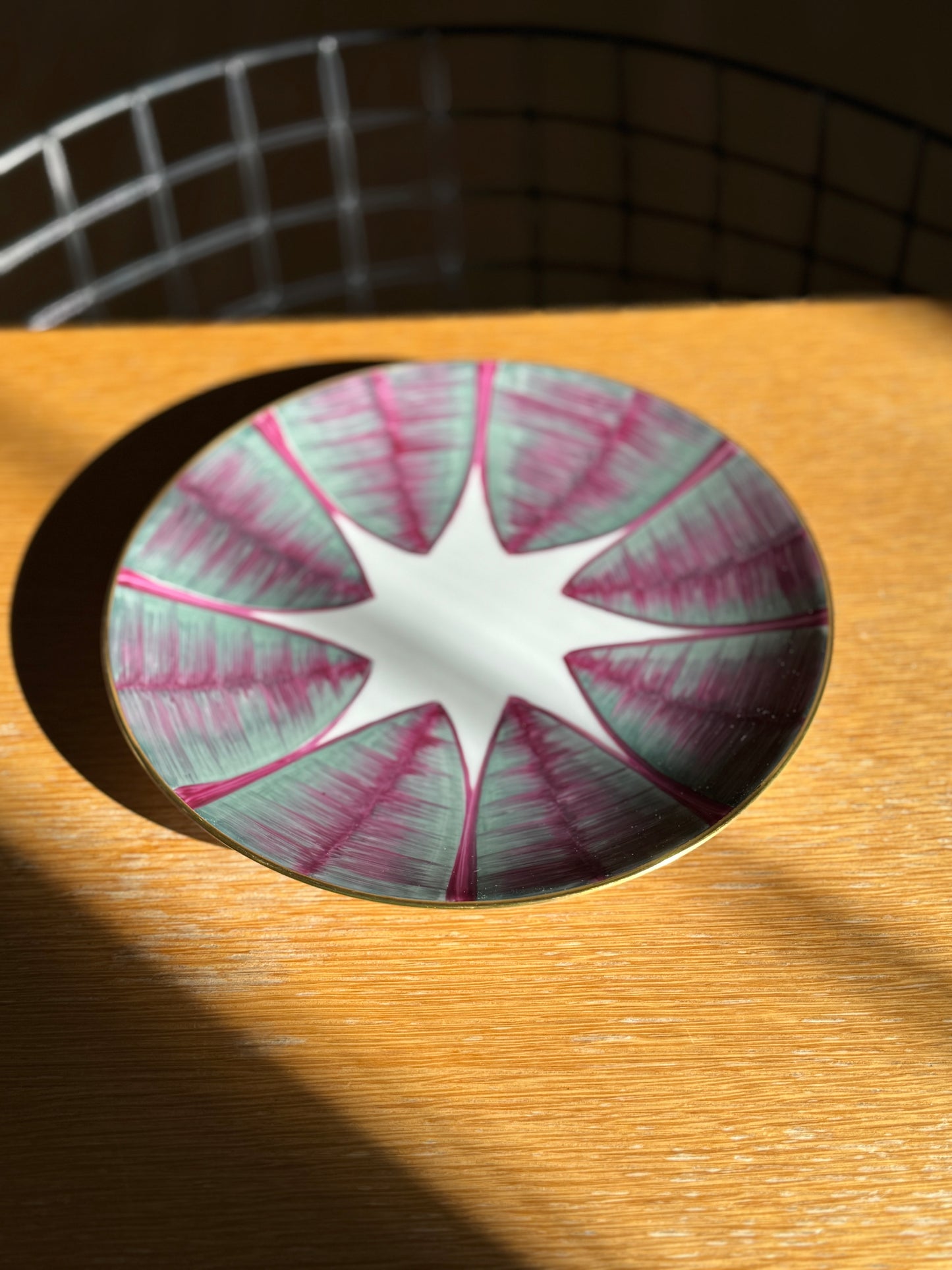 Decorative glass coaster with pink and green pattern on a wooden surface , Agave Hand-Painted Dessert Plate – Porcelain – Marie Daâge