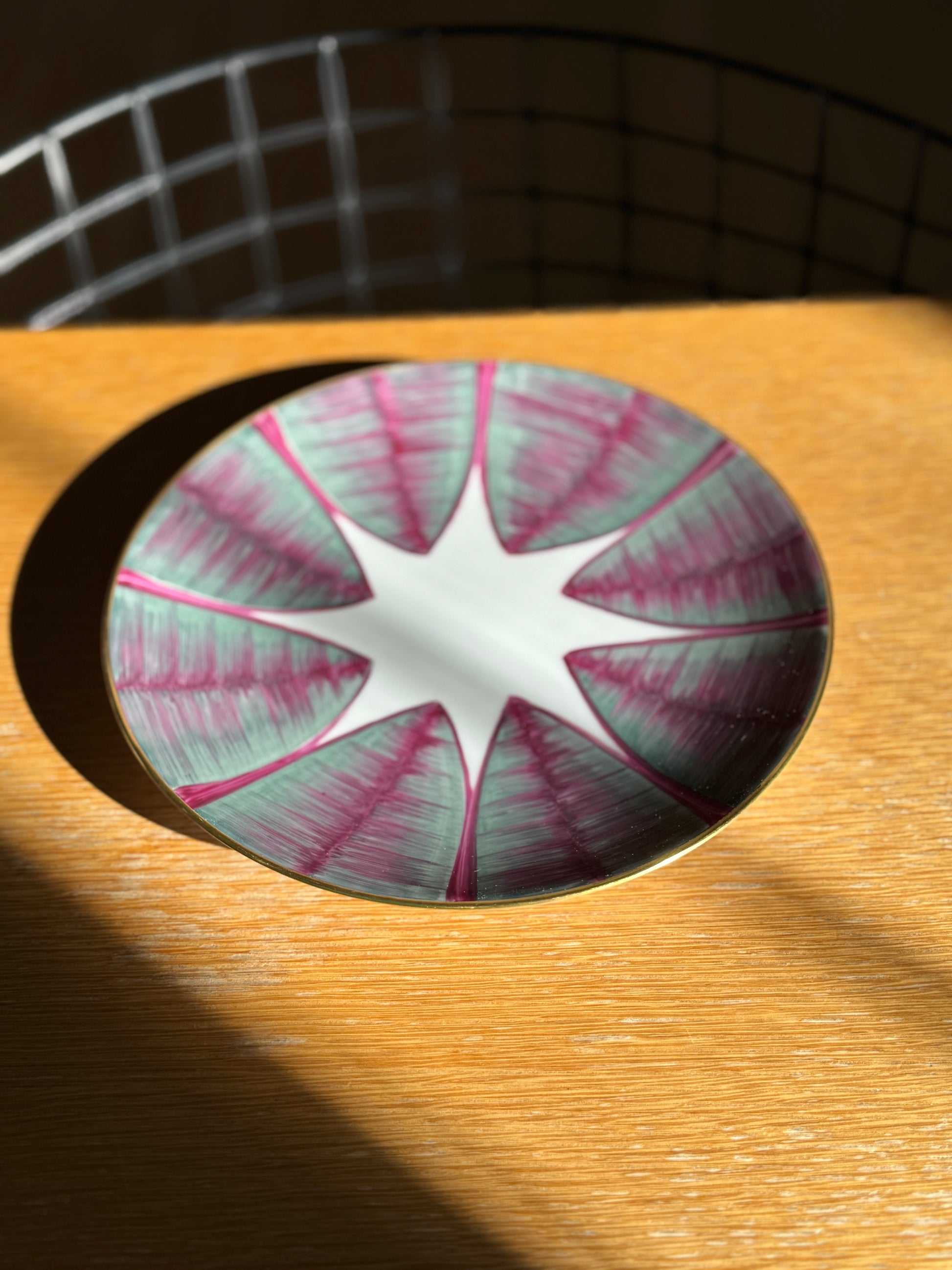 Decorative glass coaster with pink and green pattern on a wooden surface , Agave Hand-Painted Dessert Plate – Porcelain – Marie Daâge