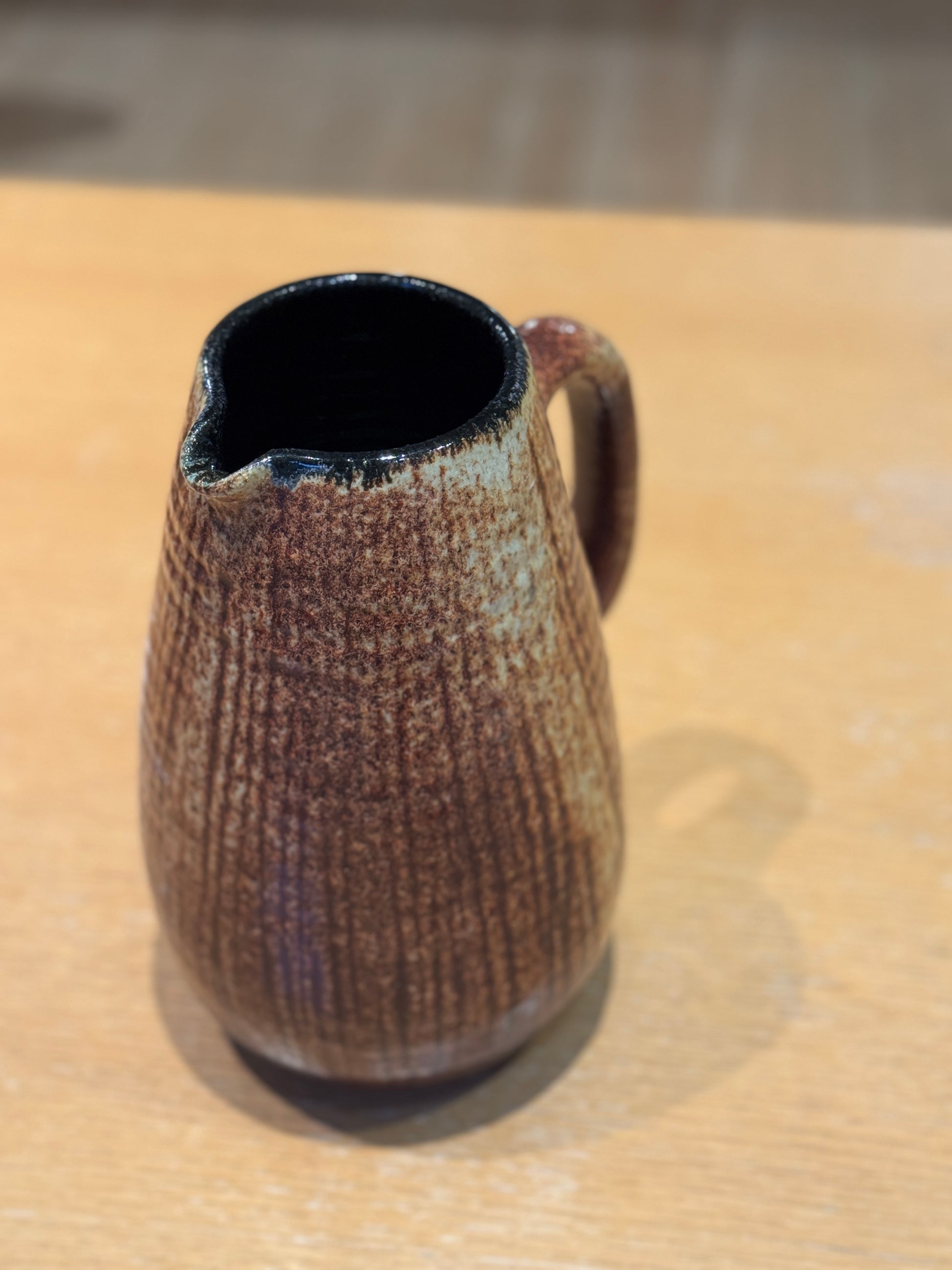 Ceramic pitcher with textured brown surface on a wooden surface, Mid-Century Vintage Vase/Pitcher – French Stoneware – Maison Holder