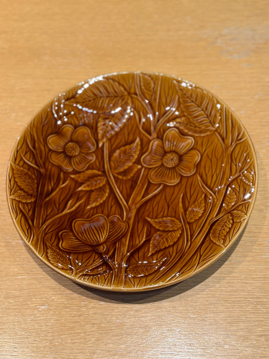 Brown ceramic plate with floral embossing on a wooden surface, Sarreguemine Shallow Bowl – Mid-Century French Ceramic – Maison Holder