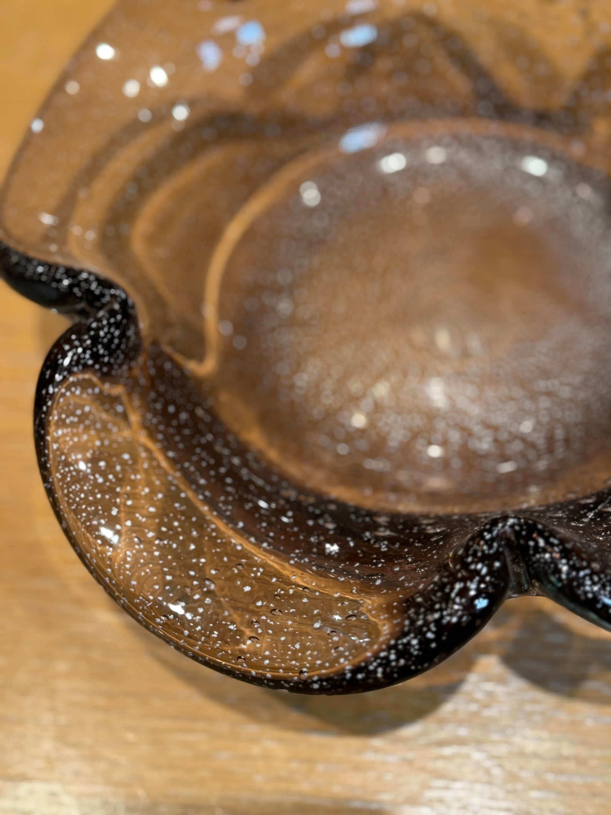 Close-up of a glass bowl with water droplets on a wooden surface, Murano Glass Bowl 1960s