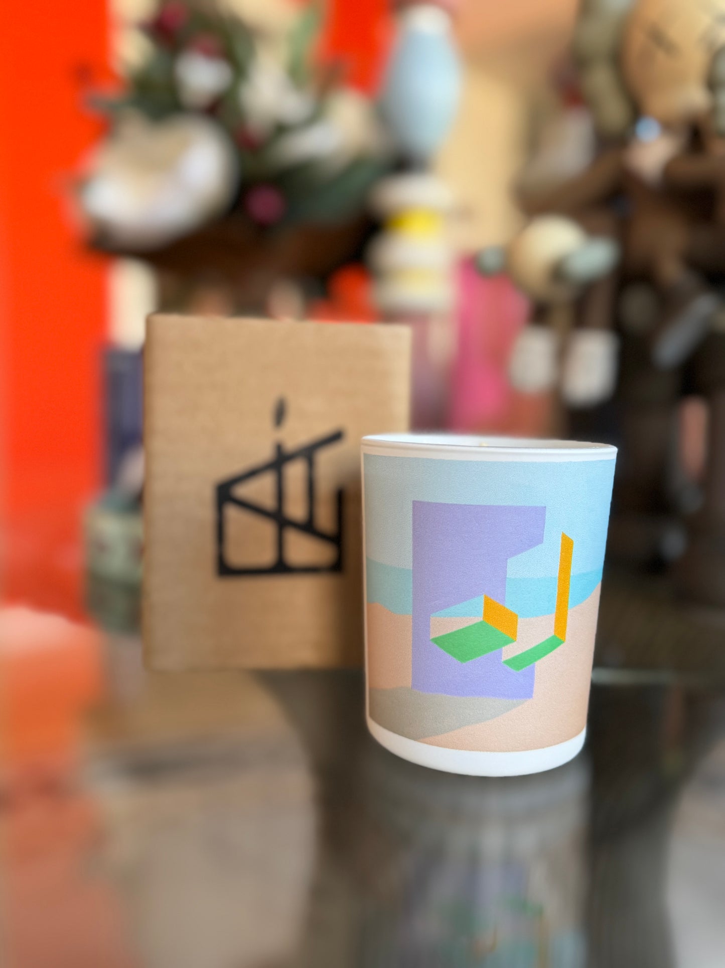 Cup with geometric design in a blurred indoor setting ,Michael Challenger Candle – Épreuve d’Artistes – Maison Holder