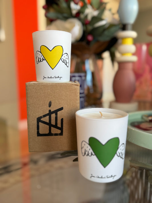 Two candles with heart designs on a surface with a blurred background, Jean-Charles de Castelbajac Art Candle – Épreuve d’Artistes – Maison Holder