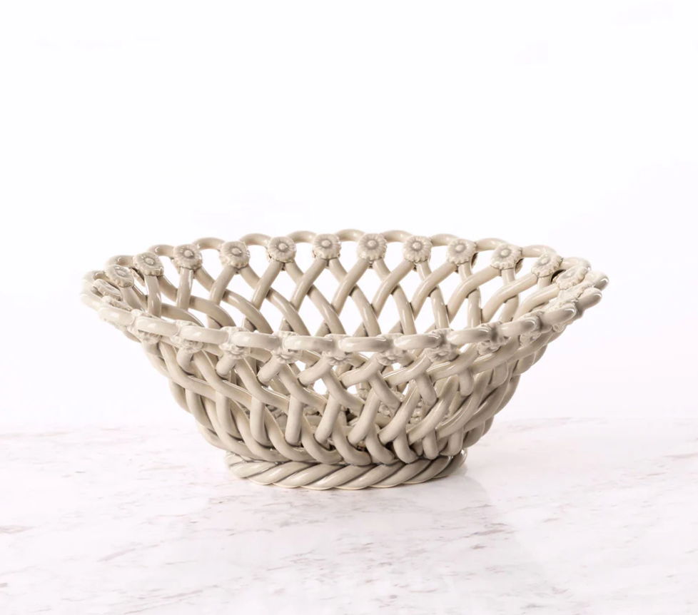 Woven basket on a white marble surface,Lisa Iconic Basket – Handmade Ceramic – Maison Pichon
