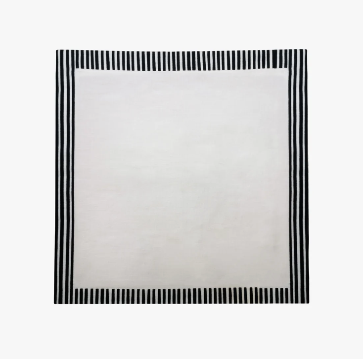 White napkin with black stripes on a white background, Milleraies Striped Linen Napkin – Aurelie Bidermann – Maison Holder