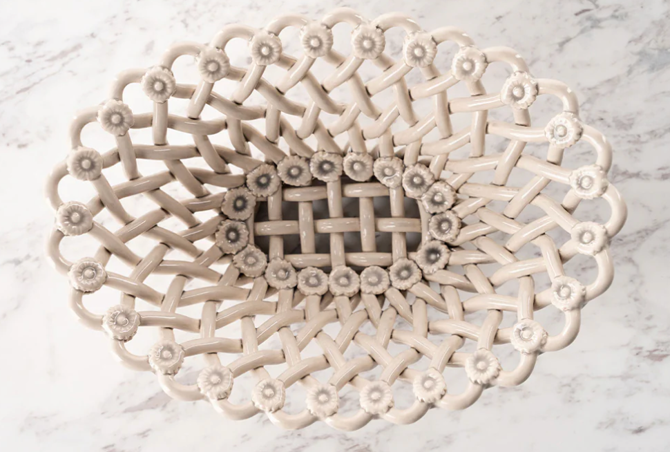 Decorative ceramic plate with intricate lace-like design on a marble surface, Lisa Iconic Basket – Handmade Ceramic – Maison Pichon