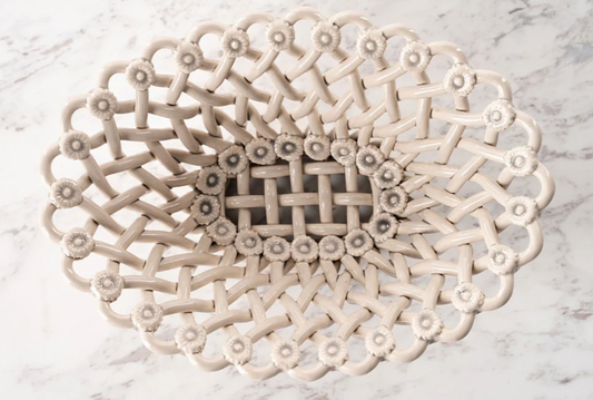 Decorative ceramic plate with intricate lace-like design on a marble surface, Lisa Iconic Basket – Handmade Ceramic – Maison Pichon