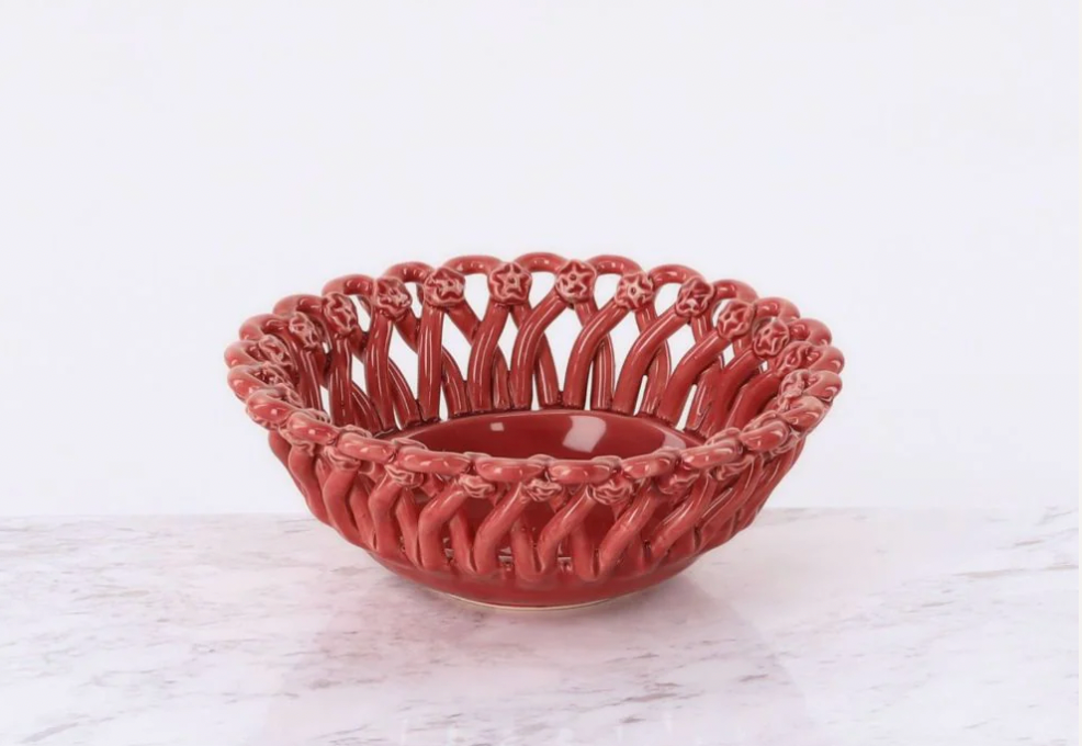Decorative red ceramic bowl on a white marble surface, Iconic Bread Basket – Maison Pichon