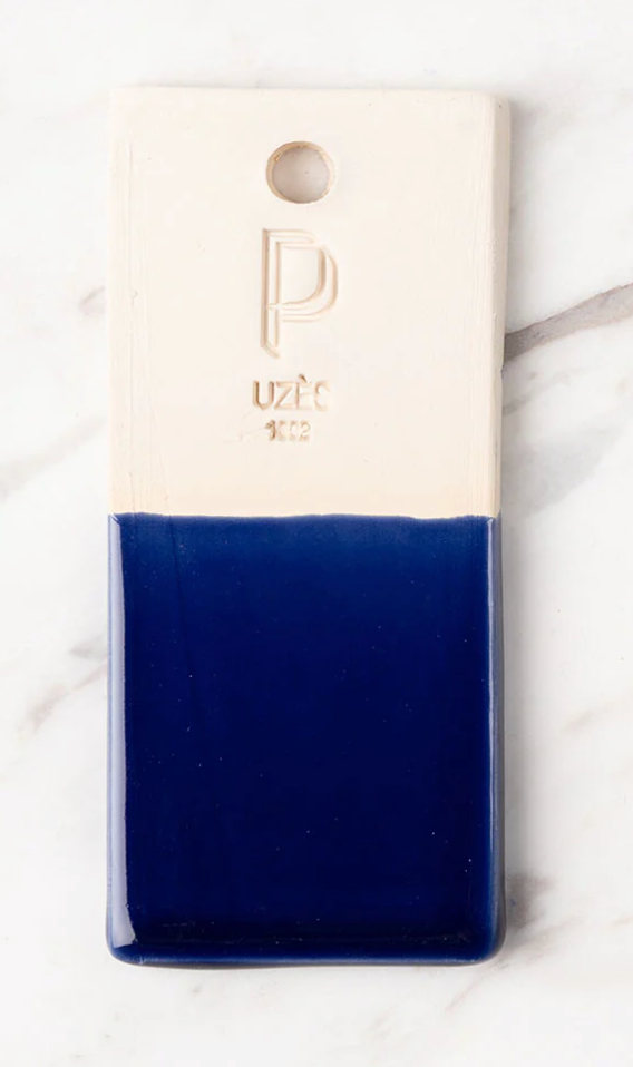 Phone case with a white top half and blue bottom half on a light background, Iconic Bread Basket – Maison Pichon