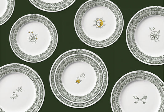 Pattern of decorative plates with intricate designs on a dark green background, Château Set of 6 Small Plates – Limoges Porcelain – Maison Holder