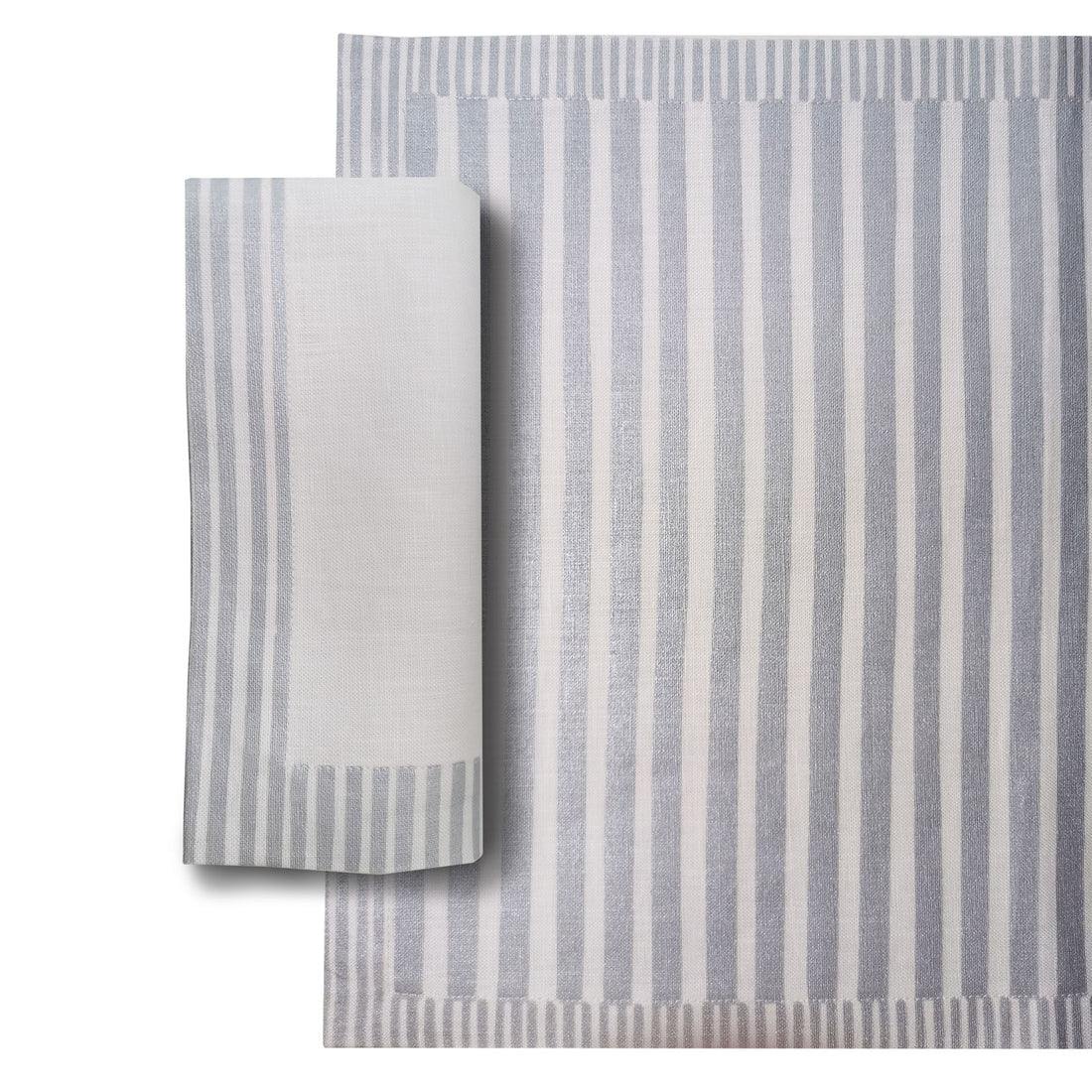 Gray and white striped placemat and napkin on a white background, Milleraies Striped Linen Placemat – Aurelie Bidermann – Maison Holder