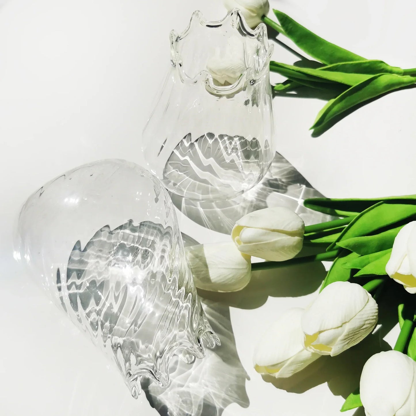 Clear glass vase with white tulips on a light background, Nabucho Straight Small Vase – Mouth-Blown Glass Elegance – Maison Holder