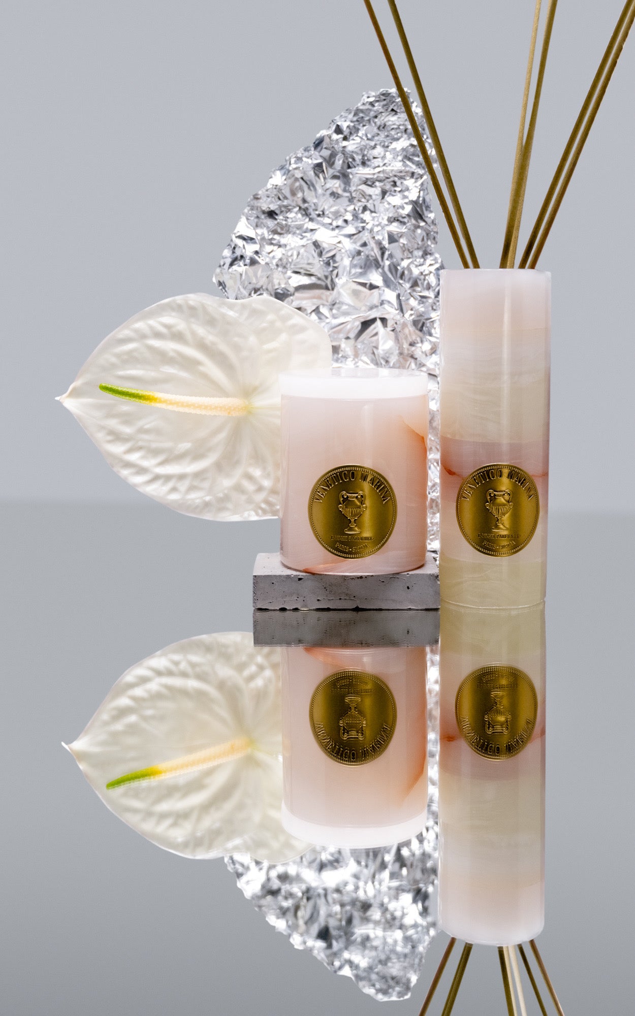 Decorative candles with gold accents on a gray background, Rose Onyx Candle – Venetico Marina Marble Candle – Maison Holder