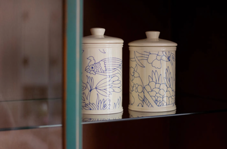 Two ceramic jars with floral designs on a dark background, Rouen Decor Storage Canister – Desvres Earthenware – Maison Holder